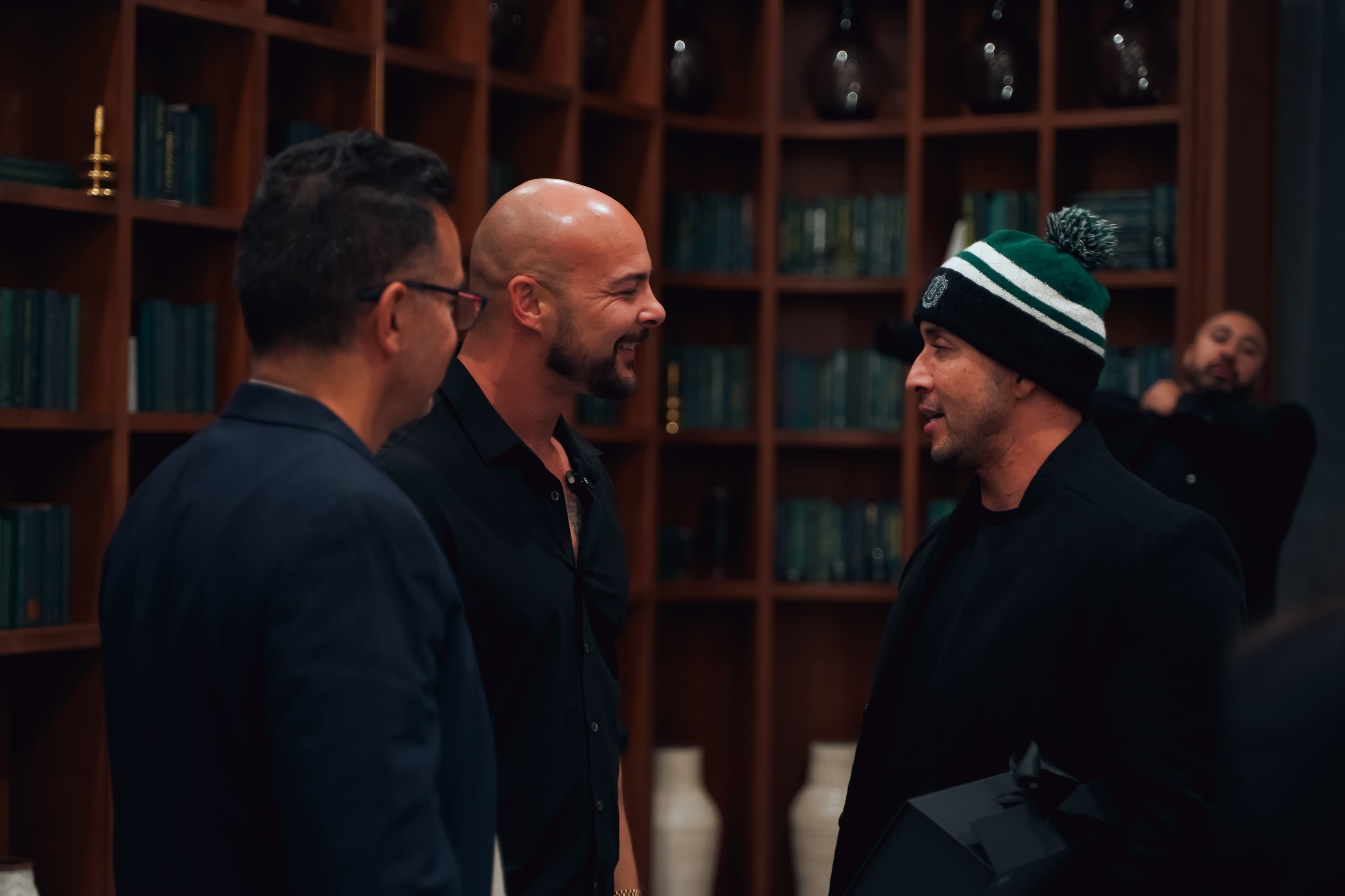 LVL 5 Brotherhood men in conversation at a mastermind event